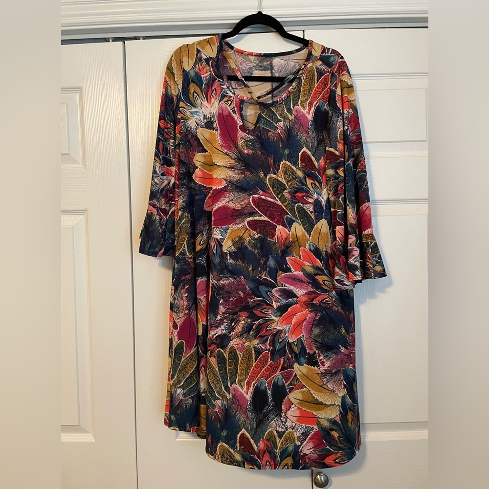 Boutique pattern dress with bell sleeves and cross cross neckline